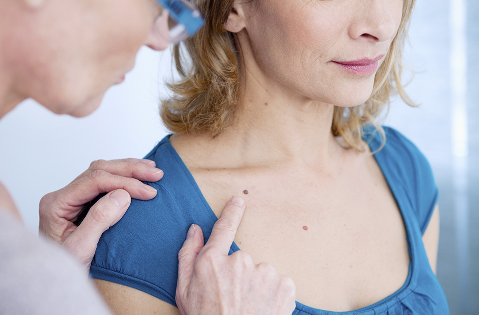 Doctor checking woman