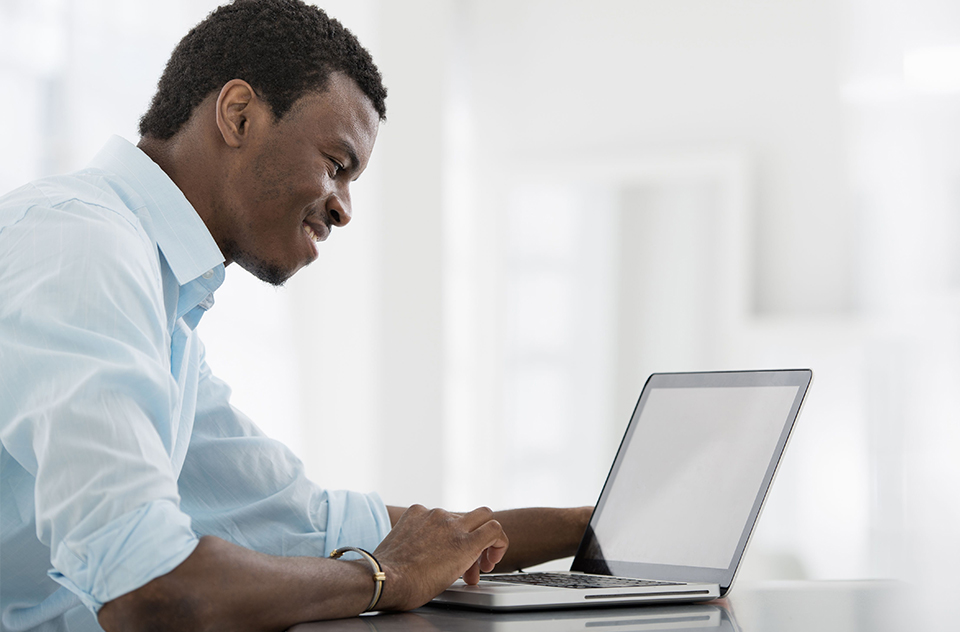 Man using Telemedicine at laptop-side