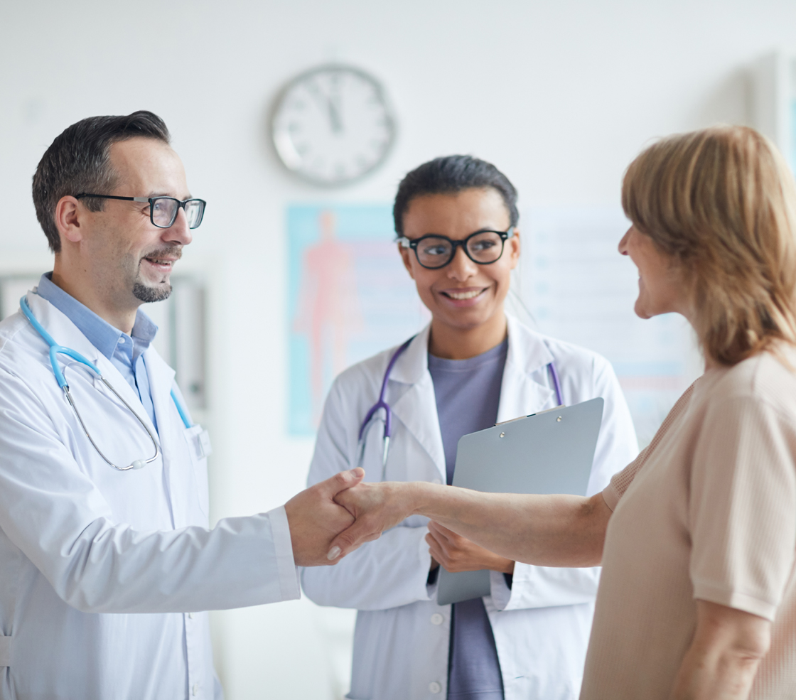 Medical professionals shaking hands