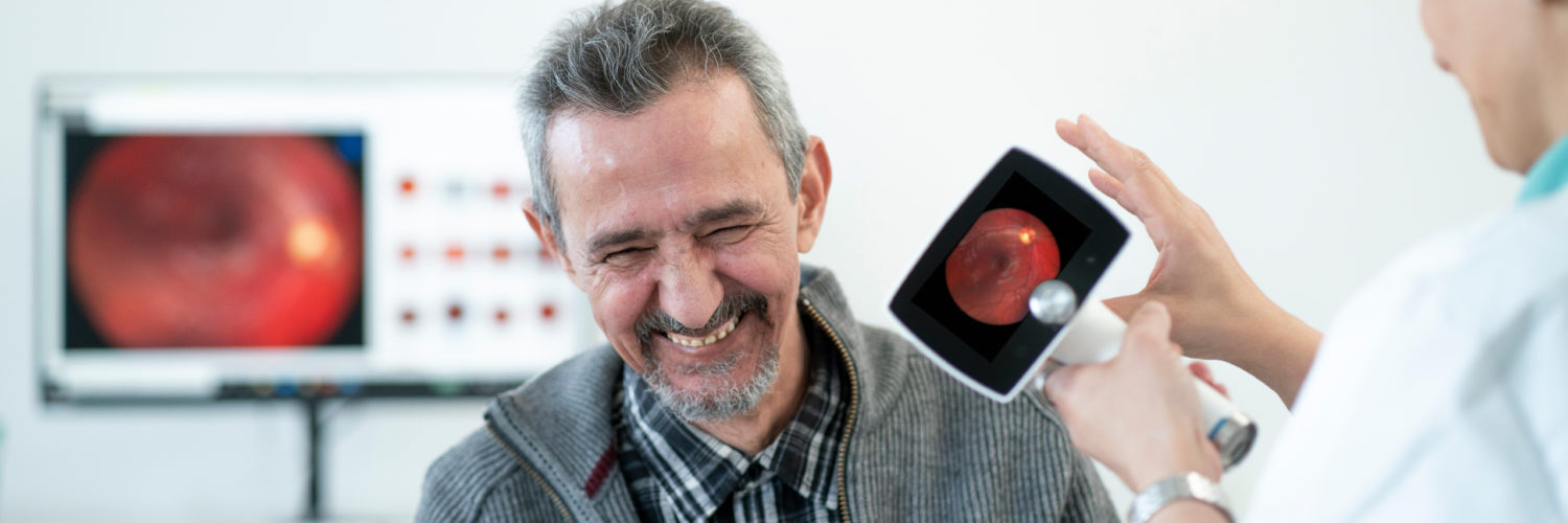 Senior patient smiling at doctor office