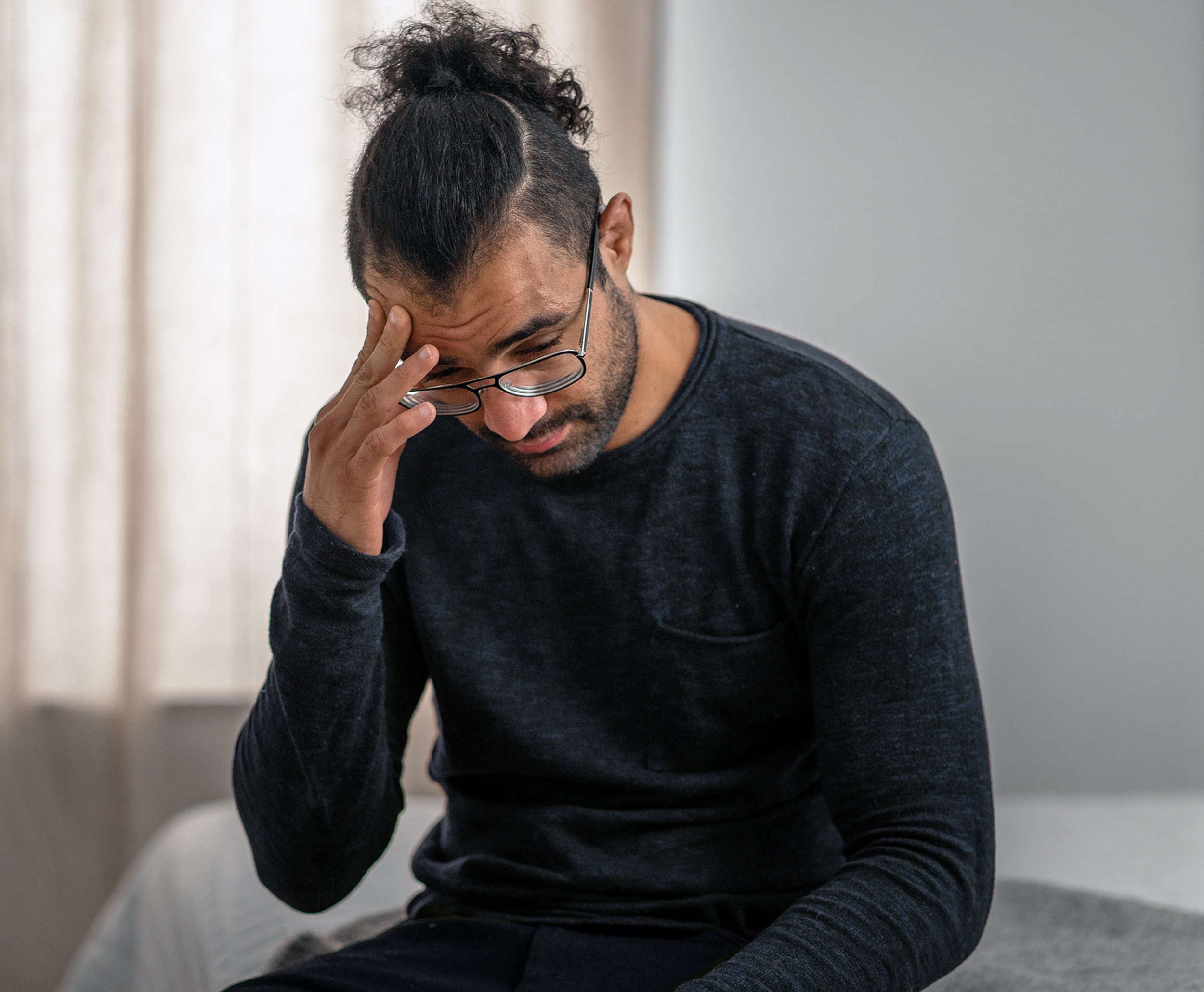 Headache patient waiting for a ocular fundus examination.