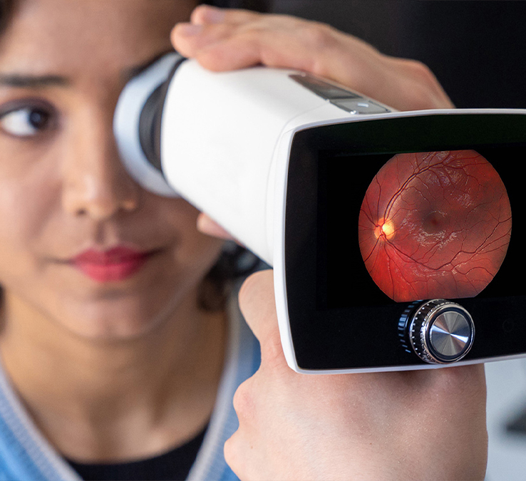 Nurse imaging patients eye